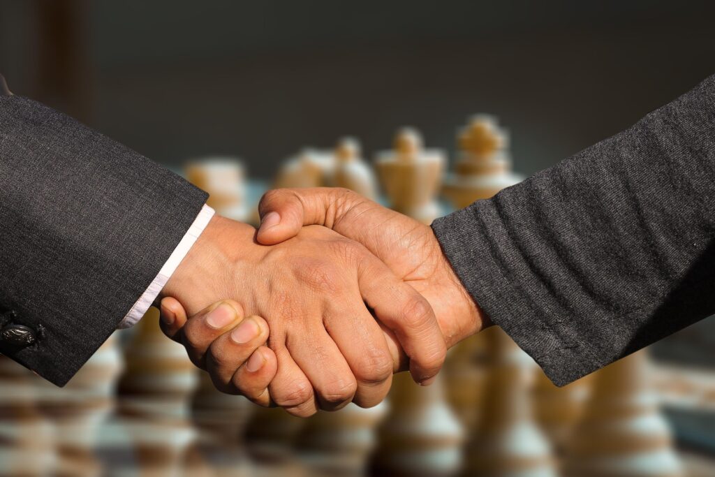 Geralt Handshake 7239620 1920 - La justicia del futuro ya está aquí: mediación en línea con Punto Justo